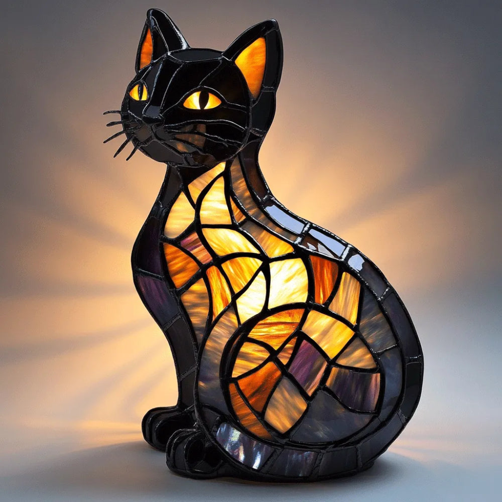Kattformad Bordslampa I Färgat Glasutseende Med Mjukt Stämningsljus
