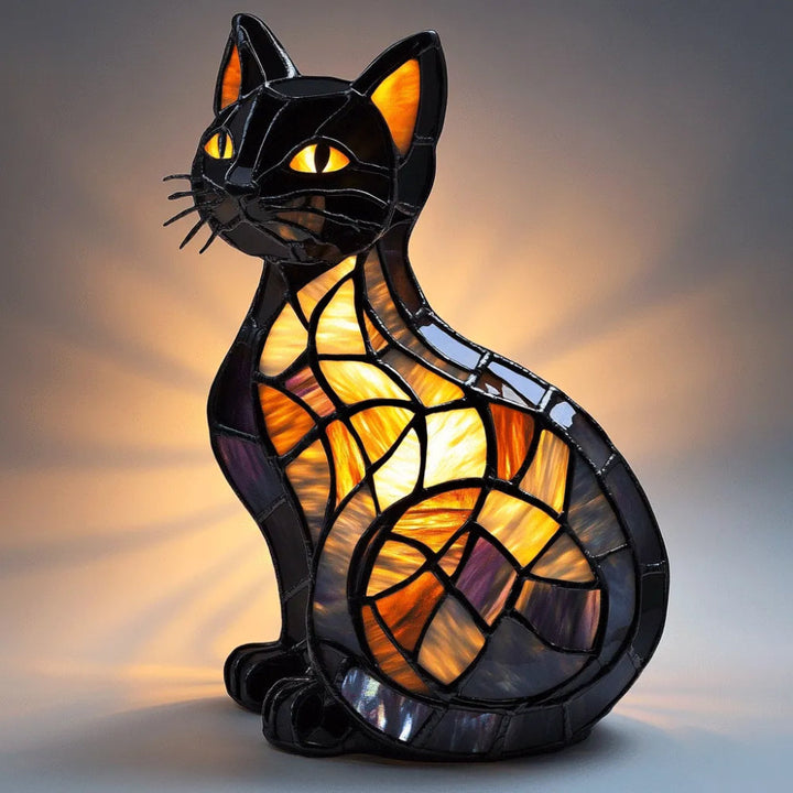 Kattformad Bordslampa I Färgat Glasutseende Med Mjukt Stämningsljus