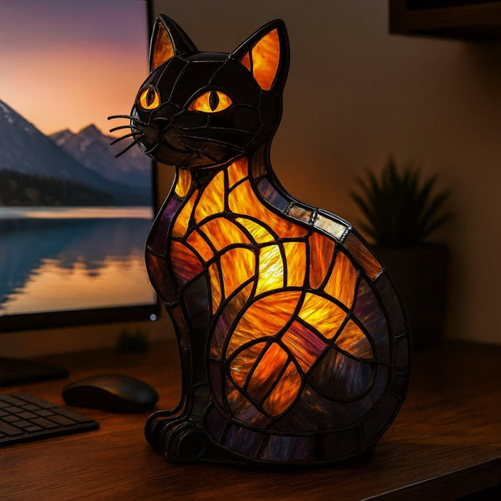 Kattformad Bordslampa I Färgat Glasutseende Med Mjukt Stämningsljus